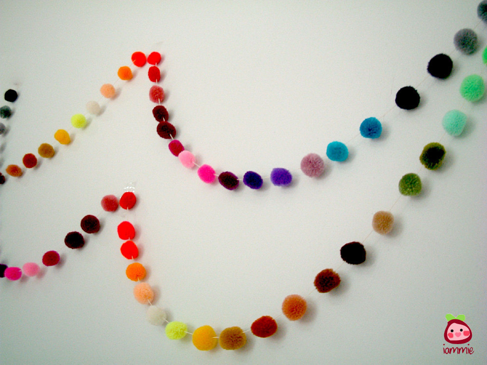 rainbow wedding inspiration pom pom garland | OneWed.com