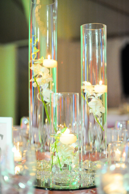 Hurricane Vases with Floating Candles and Flowers