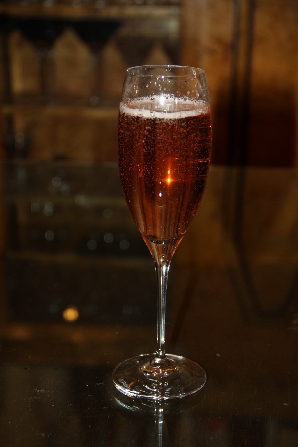 This red cocktail in a champagne flute would be perfect for any red