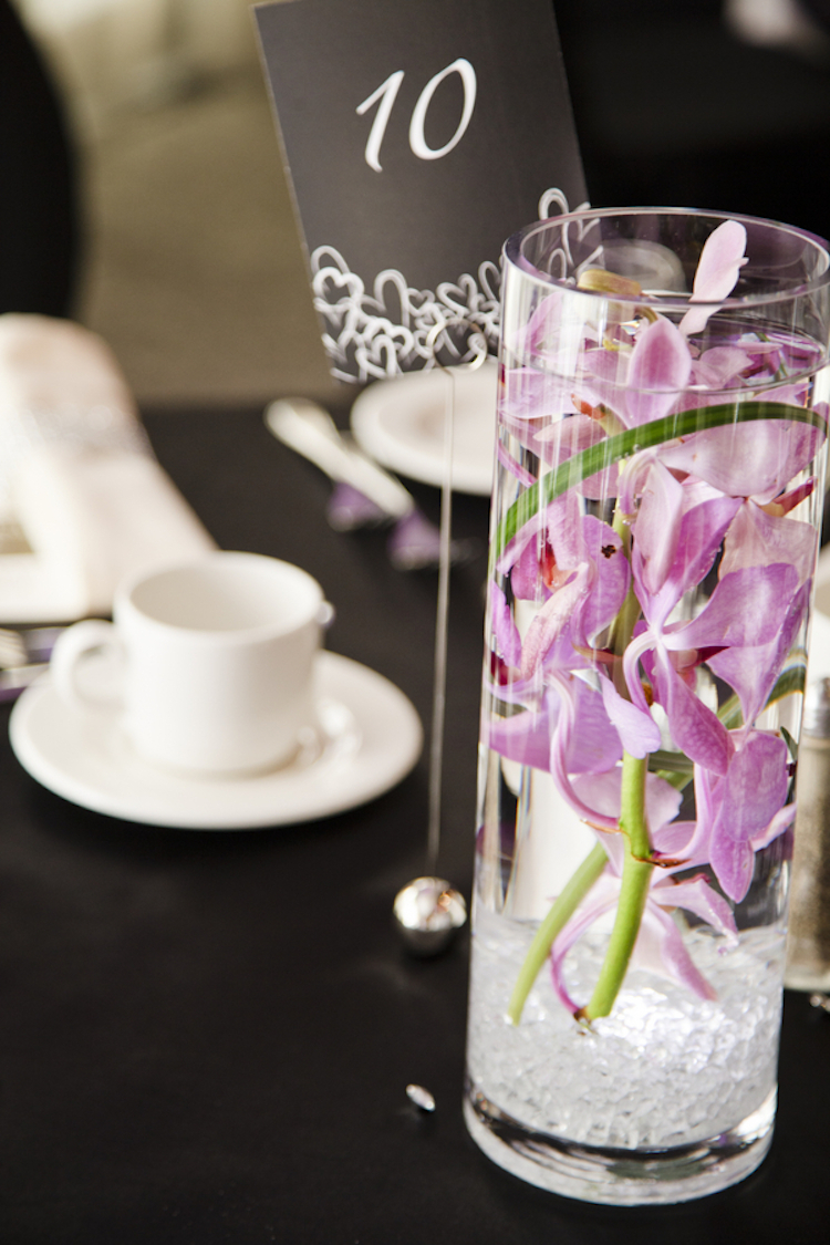 Hurricane Vases With Floating Orchids