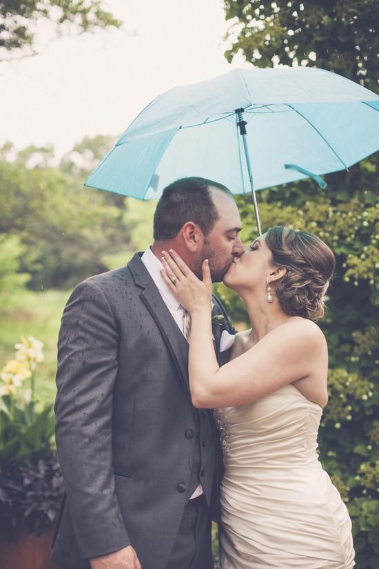 Colorful umbrellas for outdoor rainy wedding help to create