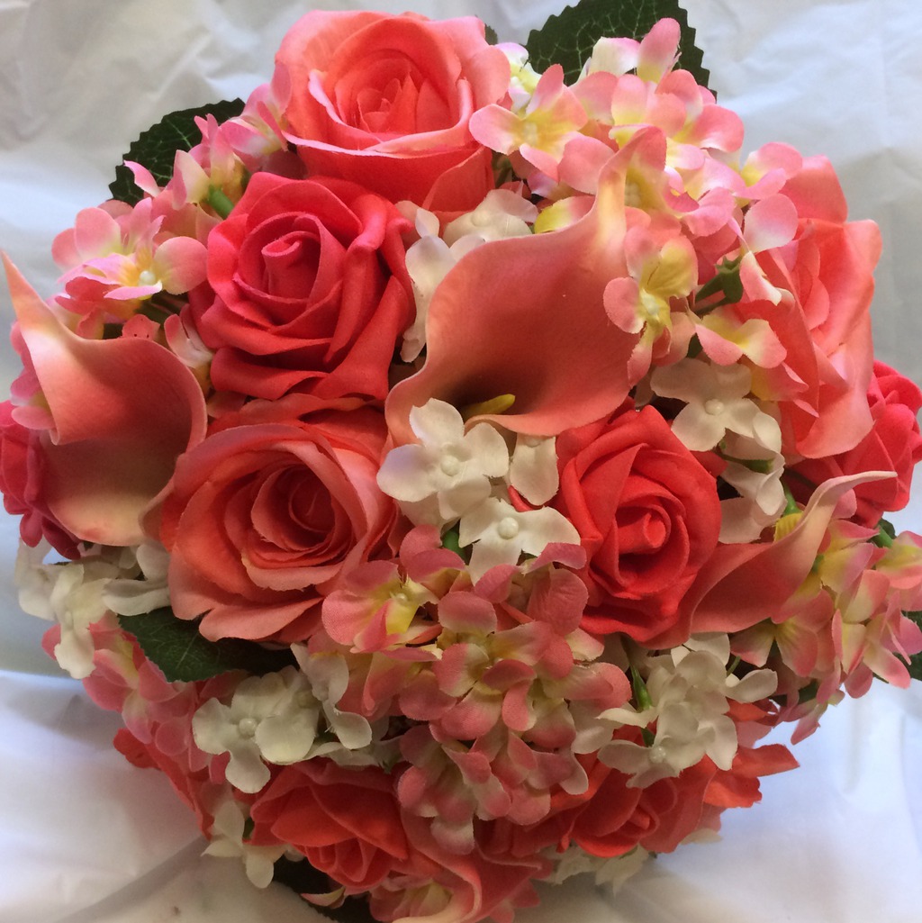 A large posy of coral flowers