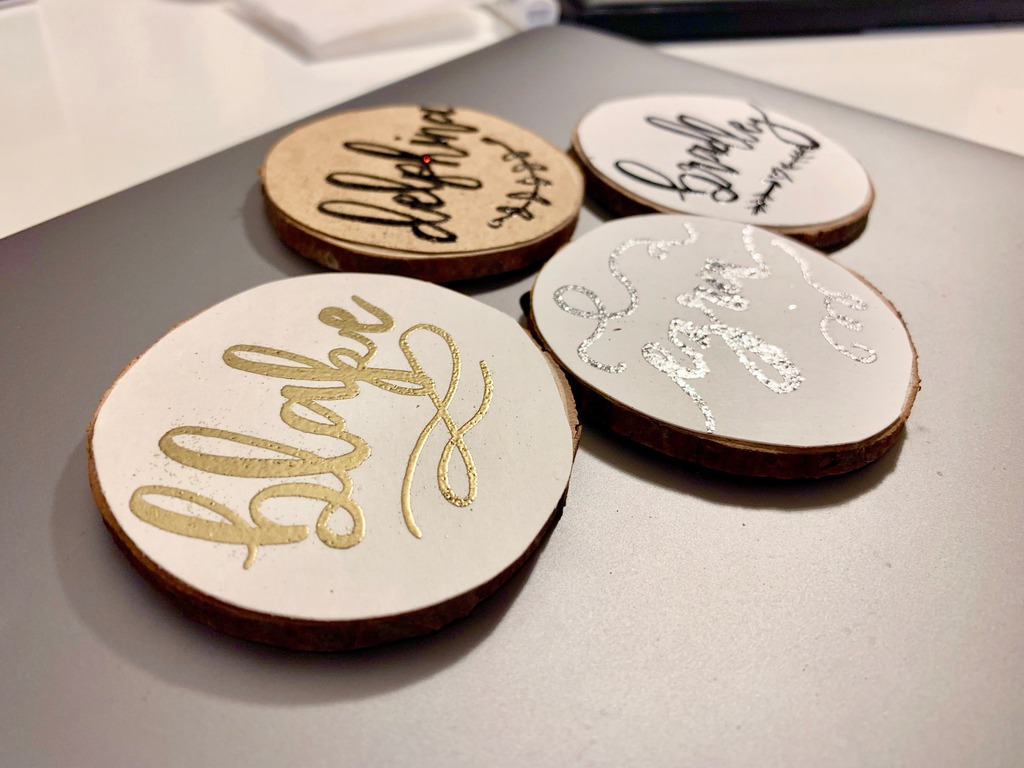 Personalized Embossed Name Cards on Wooden Slices