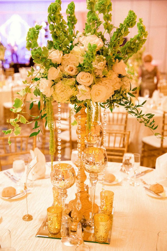 tall white ang gold centerpiece