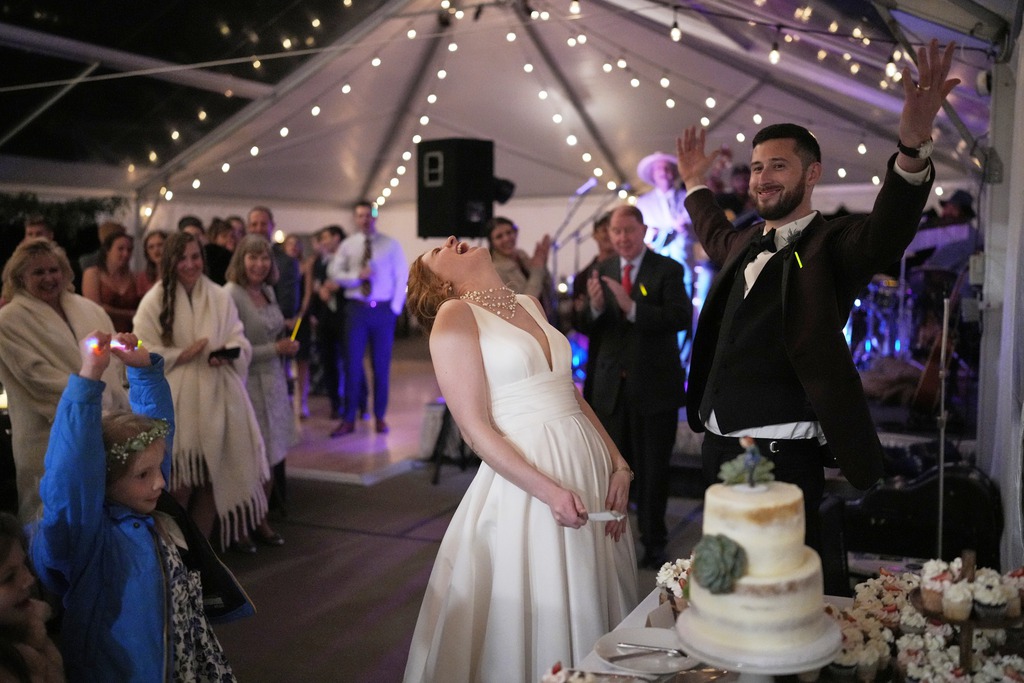 Cake Cutting Bella Vista Tent Wedding Steamboat Springs