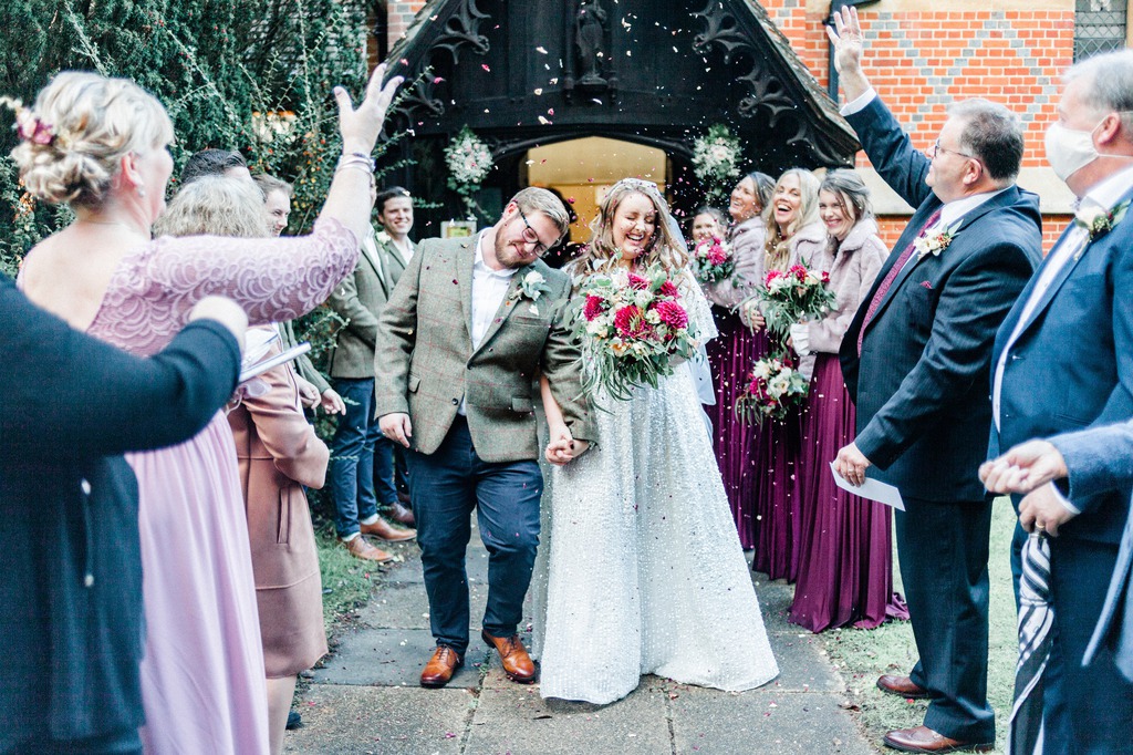 Confetti exit after church wedding in Wokingham, Berkshire