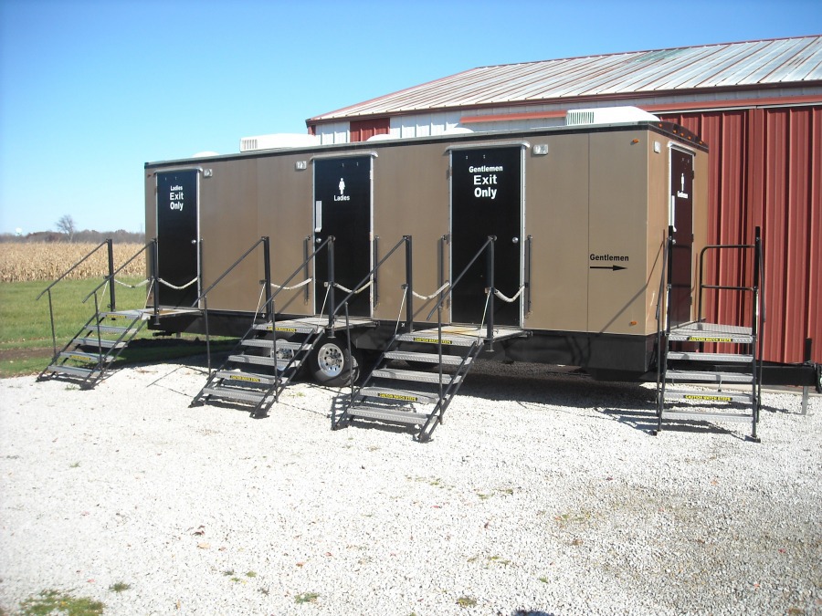 Large Gold & Black Restroom Trailer