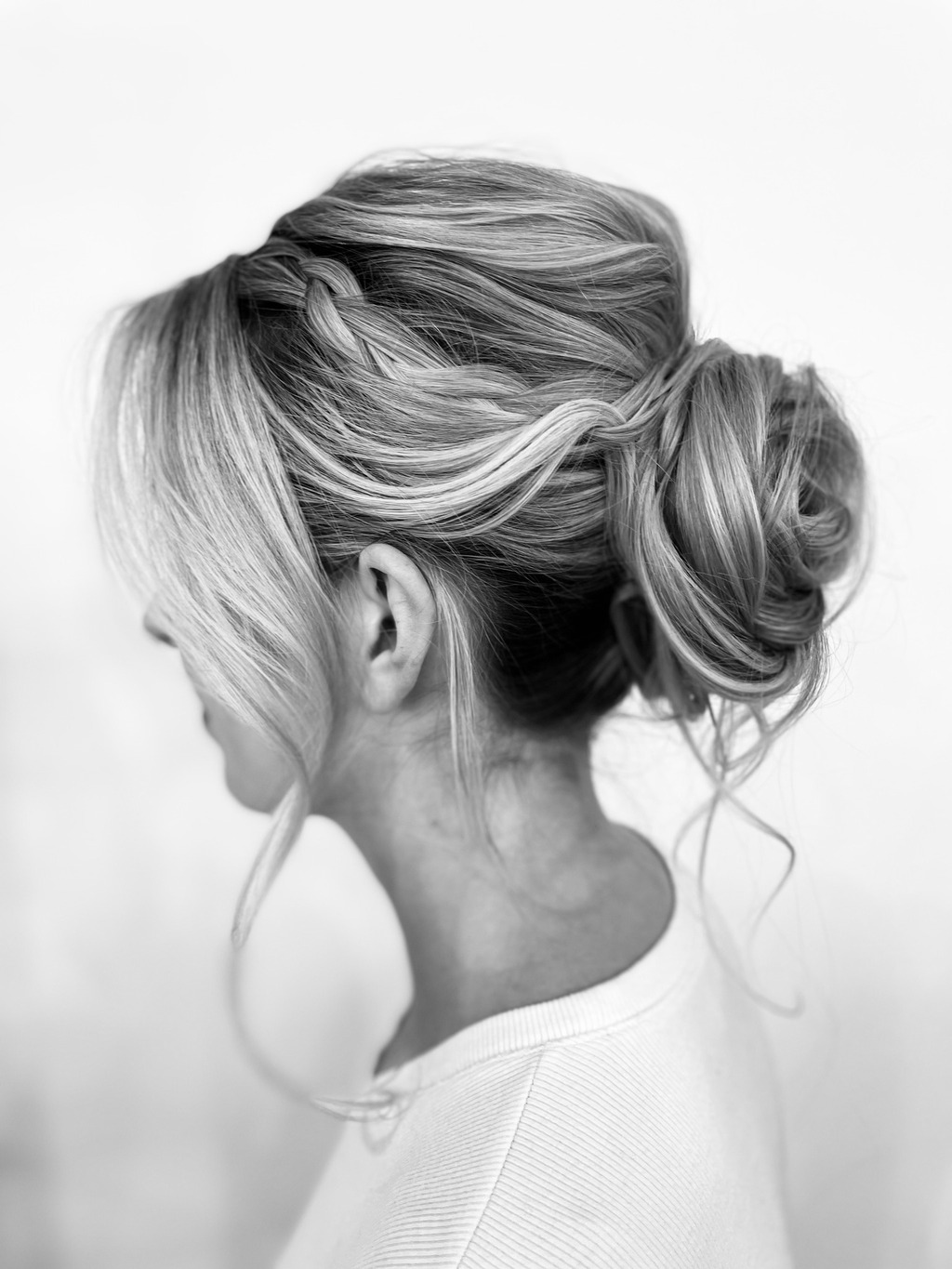 Romantic low bun with braid