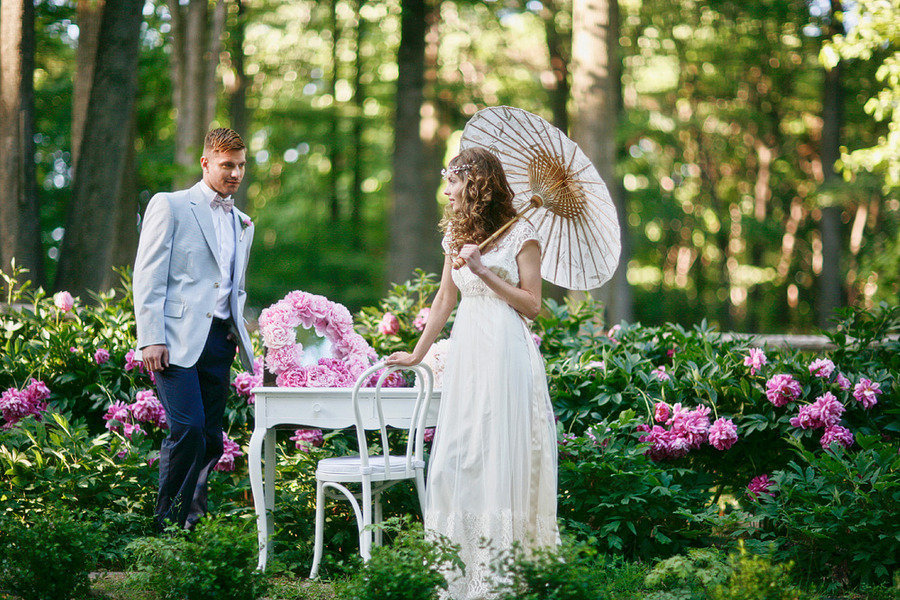 romantic spring wedding outdoor venue bride with parasol